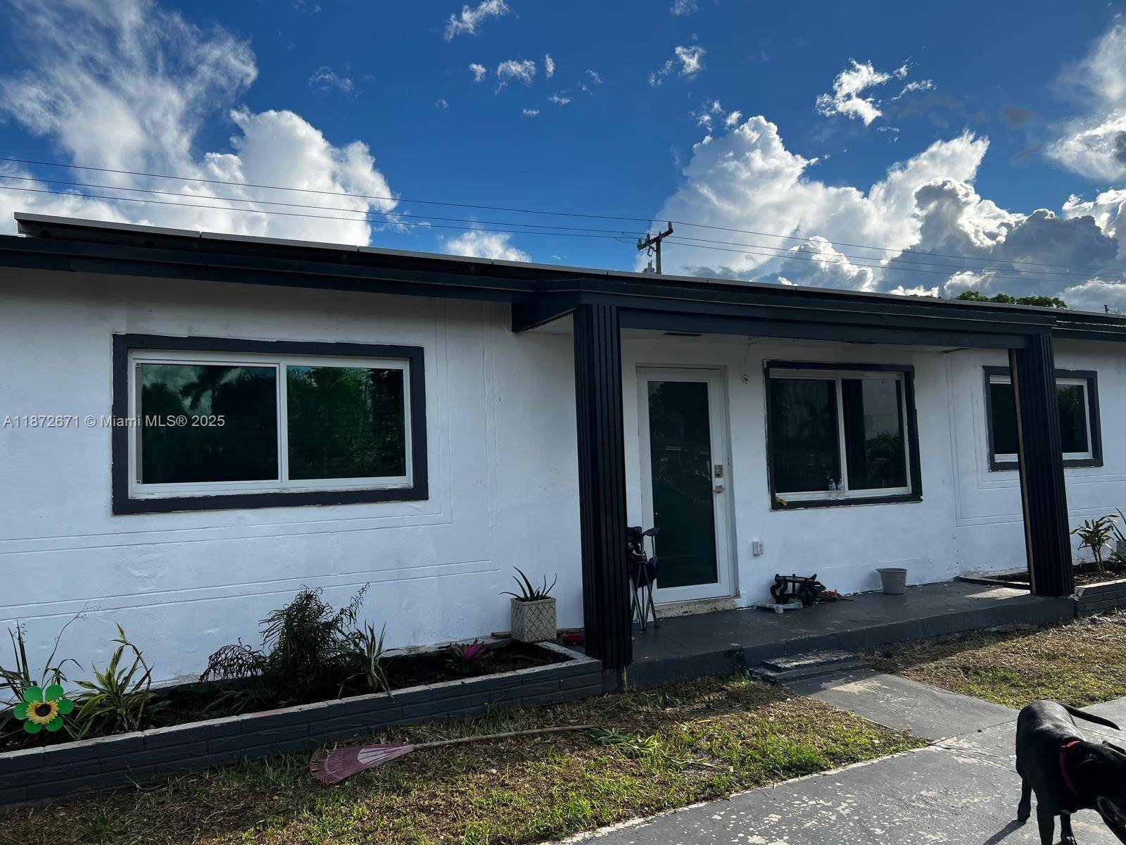 Beautifully Maintained Home As per owner information, this residence offers 4 bedrooms and 3 bathrooms, featuring a new roof, impact windows, and solar panels.