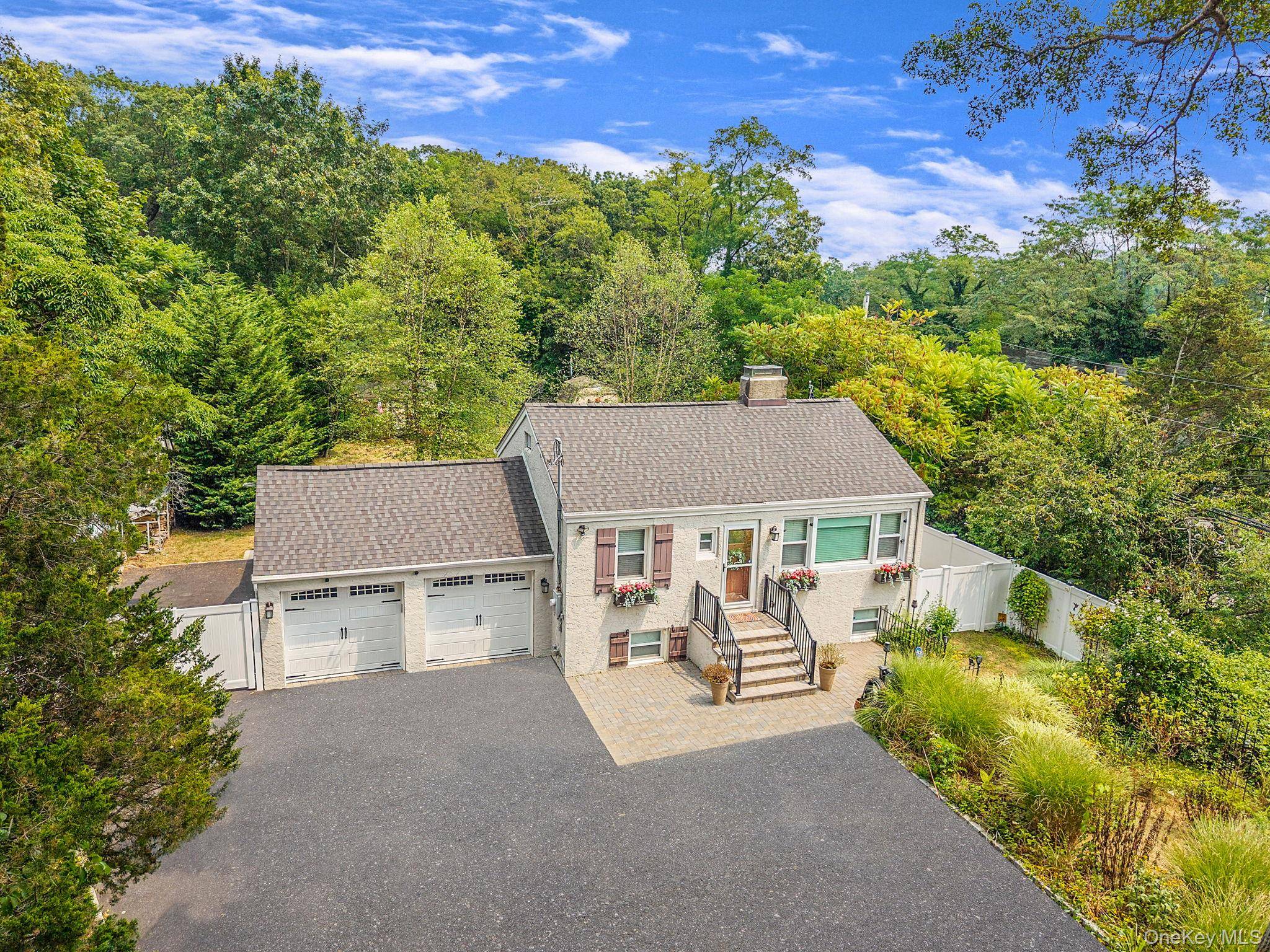 Welcome to this beautifully renovated 2 Bedroom, 2 Bathroom home situated on an expansive 1.