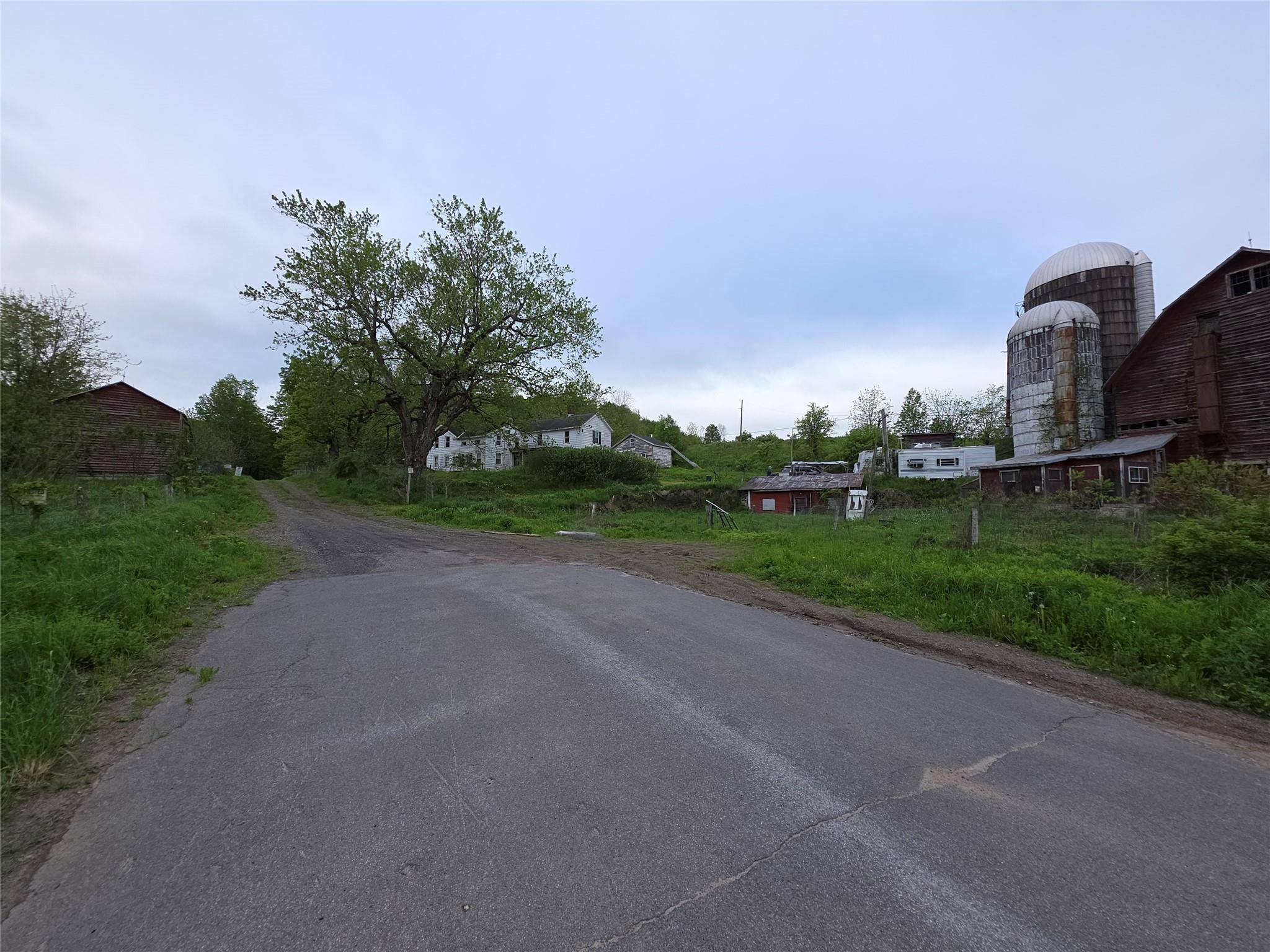 Located in Fort Plain NY, this expansive 156 Acres property offers a rare opportunity to own a premium farm and House tlc with diverse potential uses.
