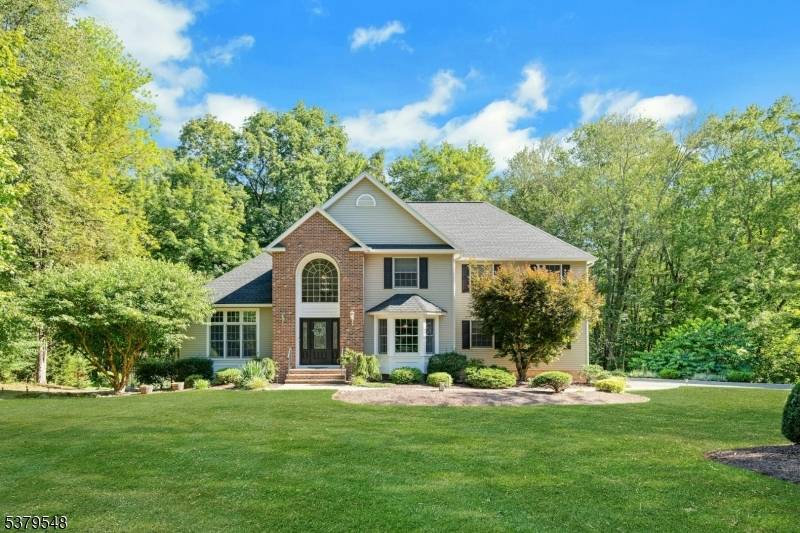 Impeccably maintained and beautifully updated, this 4 bedroom, 3.