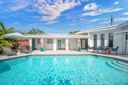 Extraordinary and Unique, Walk to Beach and Town Square 4Bed 5 Full Bath home, every Bedroom is En Suite w its own FULL Bath, Beautifully Furnished, w Stylish Transom Windows ...