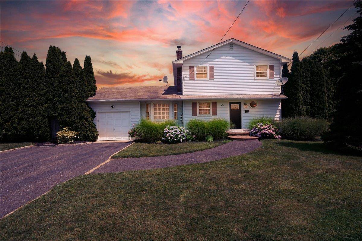 Welcome to 75 Head of the Neck Road in Bellport, a truly private and meticulously kept home.