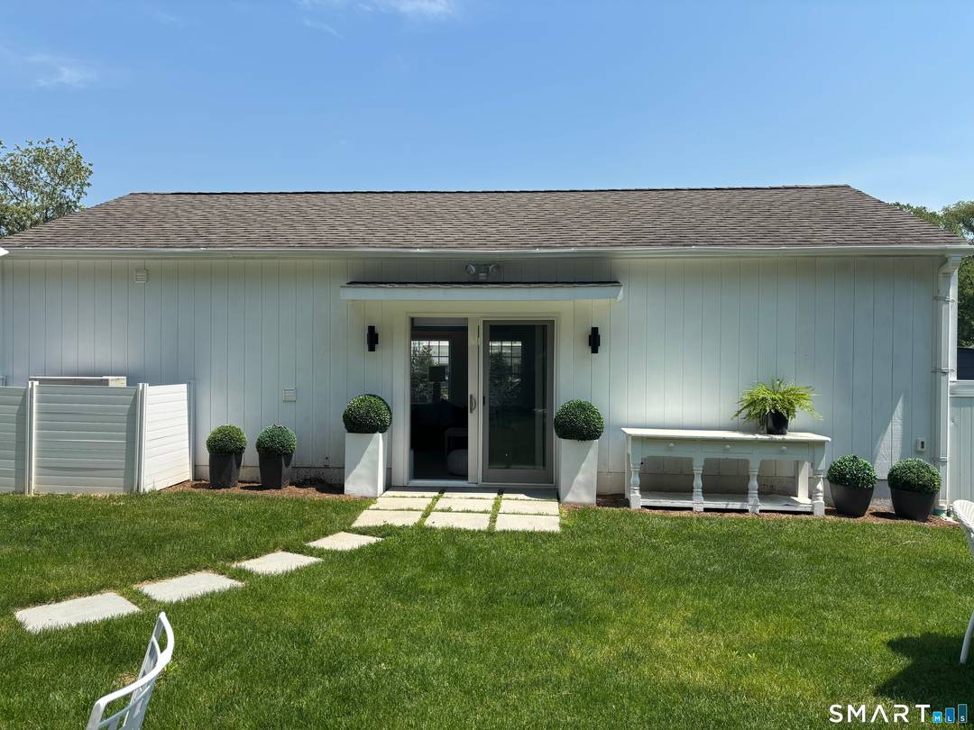 Tucked away in a private setting, this beautifully furnished newly constructed cottage offers effortless luxury and turnkey convenience.