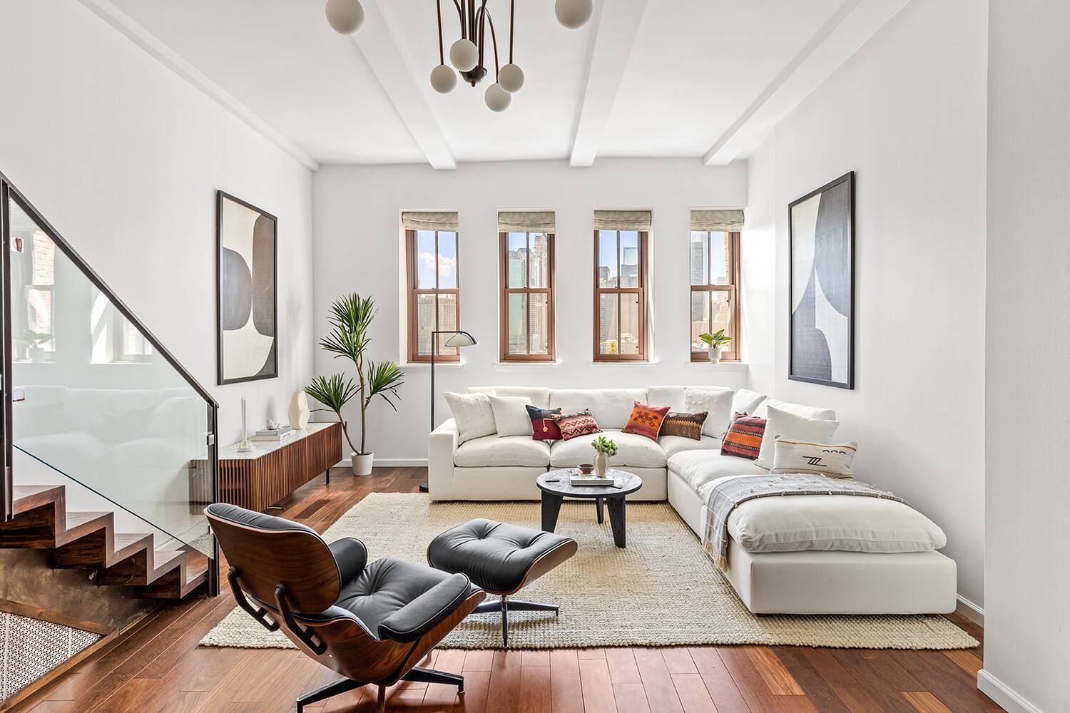 Perched atop the historic Eagle Warehouse, this exquisite duplex loft offers a rare blend of soaring elegance and serene waterfront living, where every window frames breathtaking, protected views of the ...