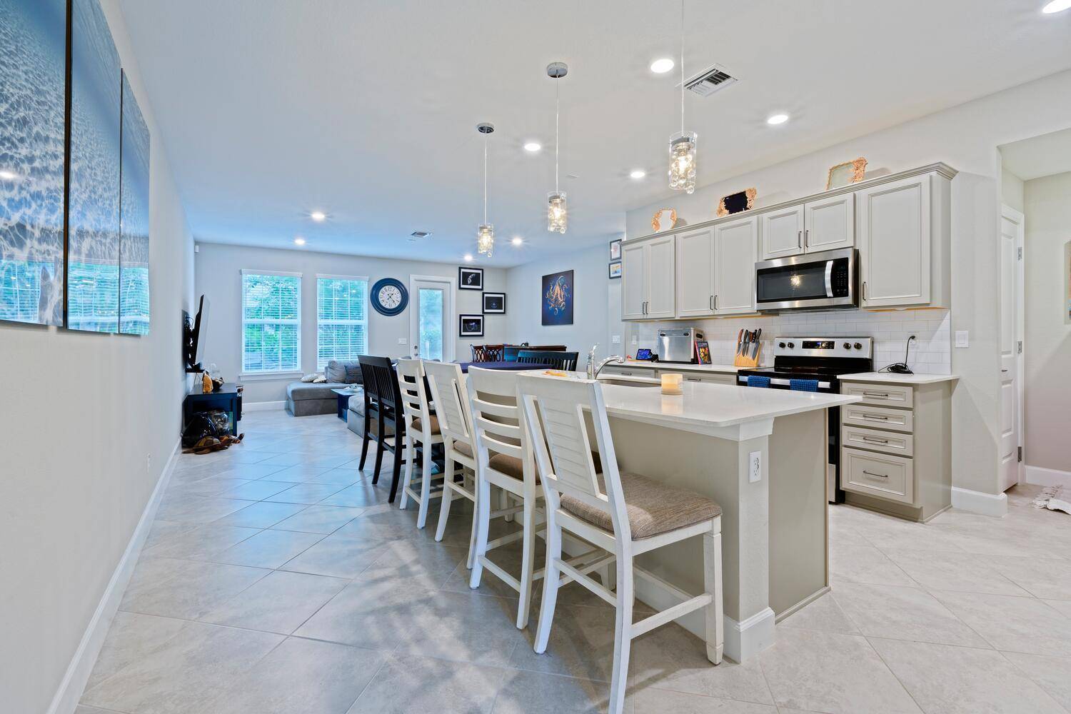 Welcome home to this stunning, coastal inspired townhome located in the highly desirable Ocean Cove community.