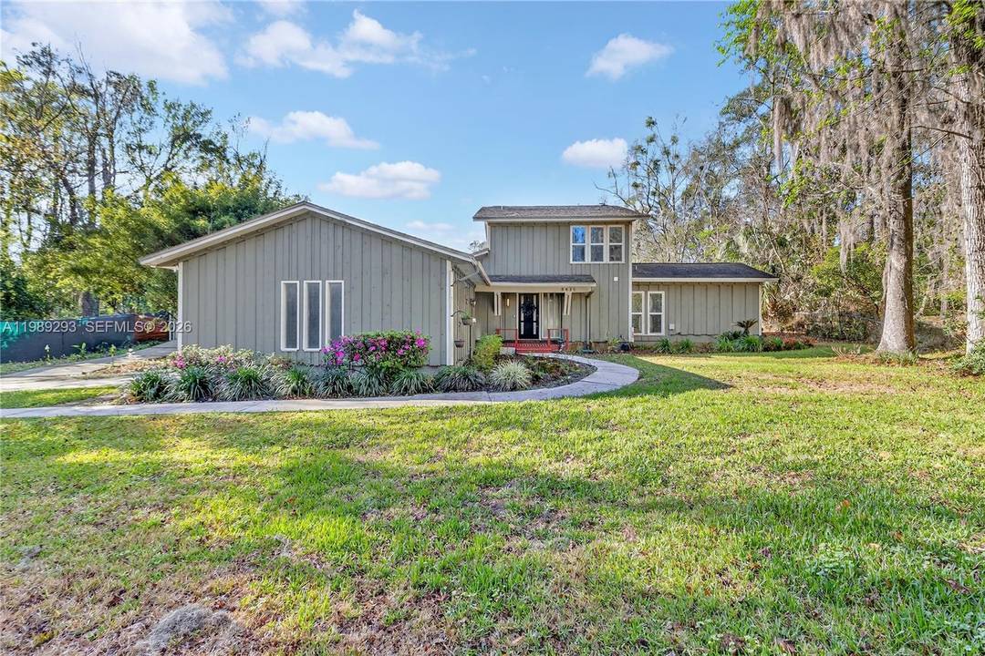Tucked away on a private 3 4 acre lot in desirable Buckingham East neighborhood, this 1970's mid century inspired ranch home offers a rare blend of light filled living and ...