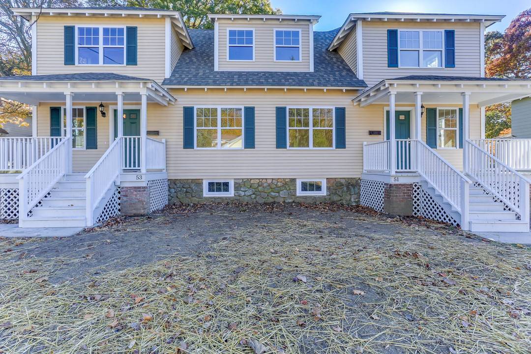 Gorgeous, fully renovated townhouse style two family home for sale on a beautiful, quiet residential street in Groton.