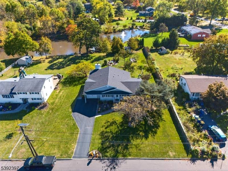 Unsurpassed setting ! This stunning 3 bedroom, 2 full bath custom ranch sits on a gorgeous 1 2 acre lot backing to a tranquil private pond.