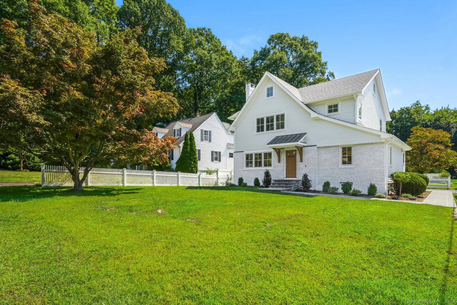 This newly re built 4 bedroom, 3 bath Colonial offers 2400 sq feet of finely crafted living space on a level.