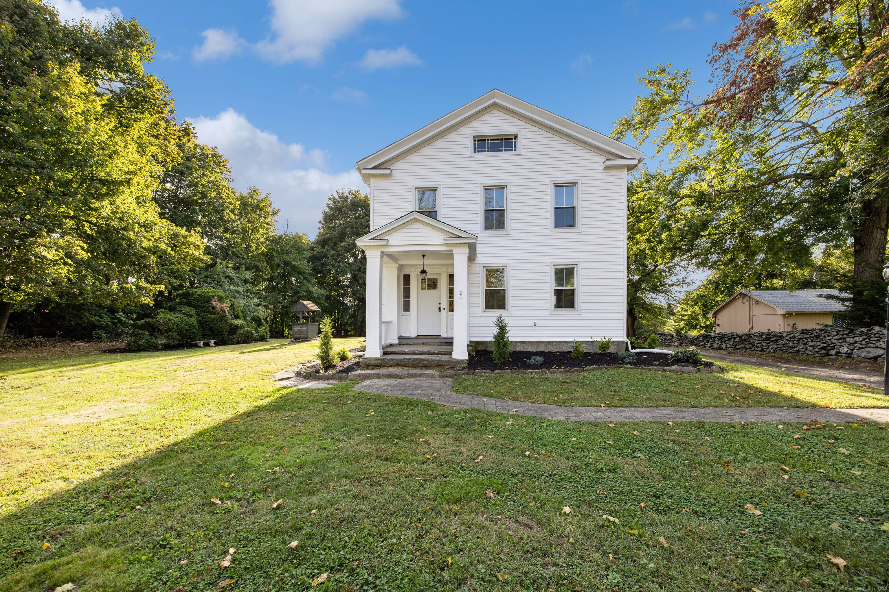 Exquisite Fully Updated Stately Colonial set on a manicured level lot, this distinguished Colonial blends timeless elegance with modern updates.