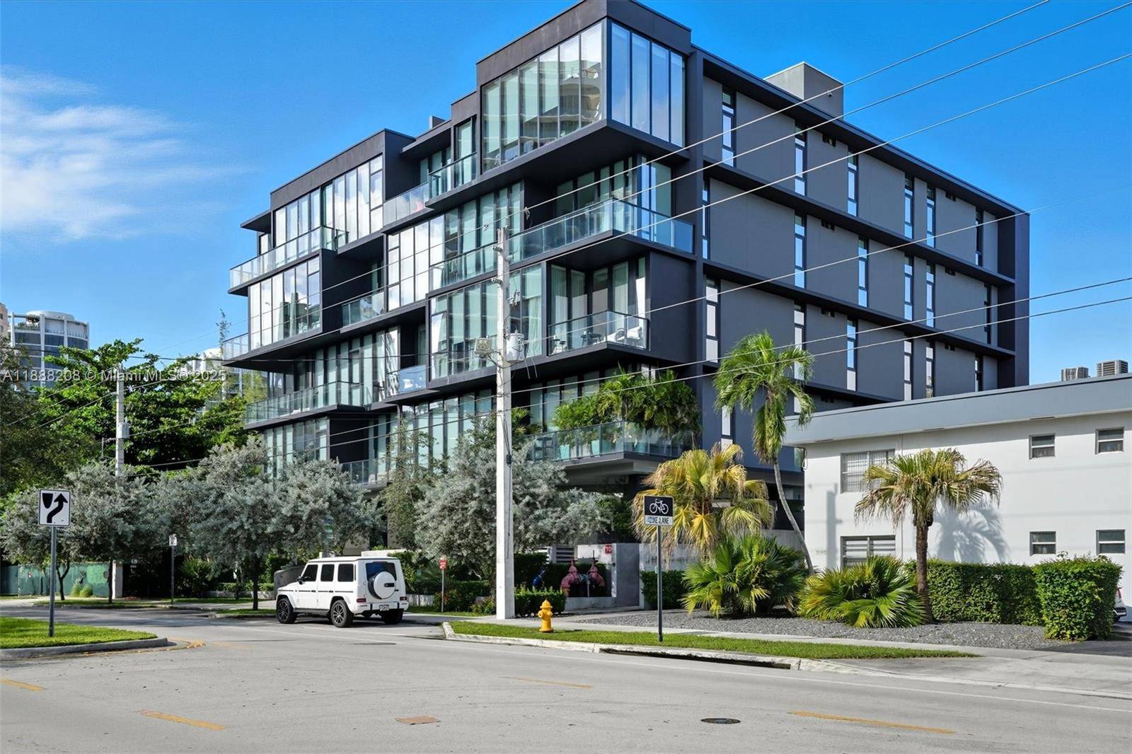 Exclusive opportunity to own a Glasshaus condo, a stunning, light filled residence with floor to ceiling windows and a full wall balcony accessible from the living room and primary suite.