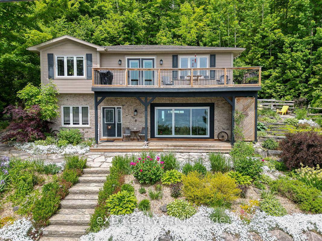 This outstanding waterfront home on Colpoys Bay offers a year round, 5 bedroom, 3 bath family haven in a natural setting.