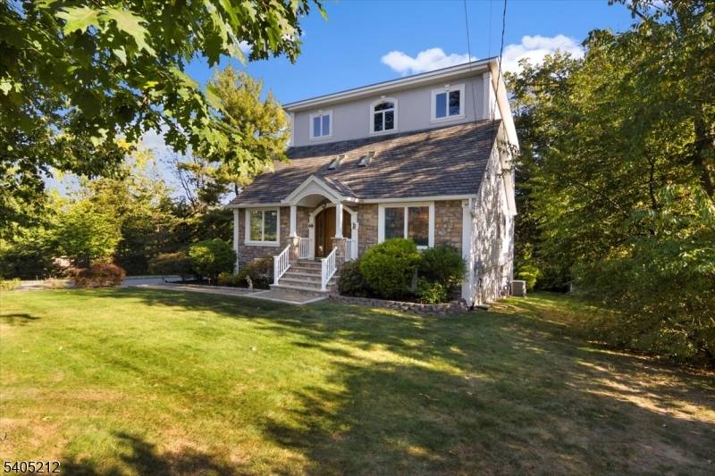 Welcome to 68 Horseneck Rd, a beautifully renovated custom home set on desirable Montville Township.
