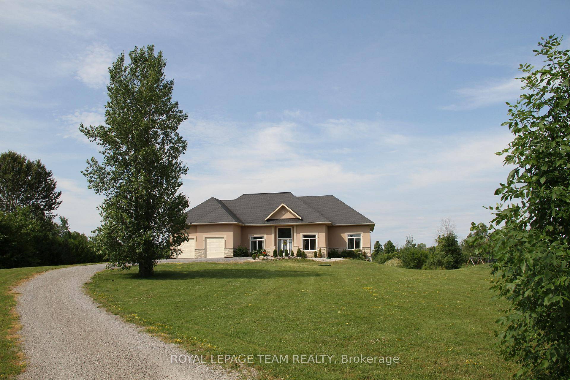 Welcome to 195 Stonewood Dr in the distinguished community of Country Lane Estates on over 1.