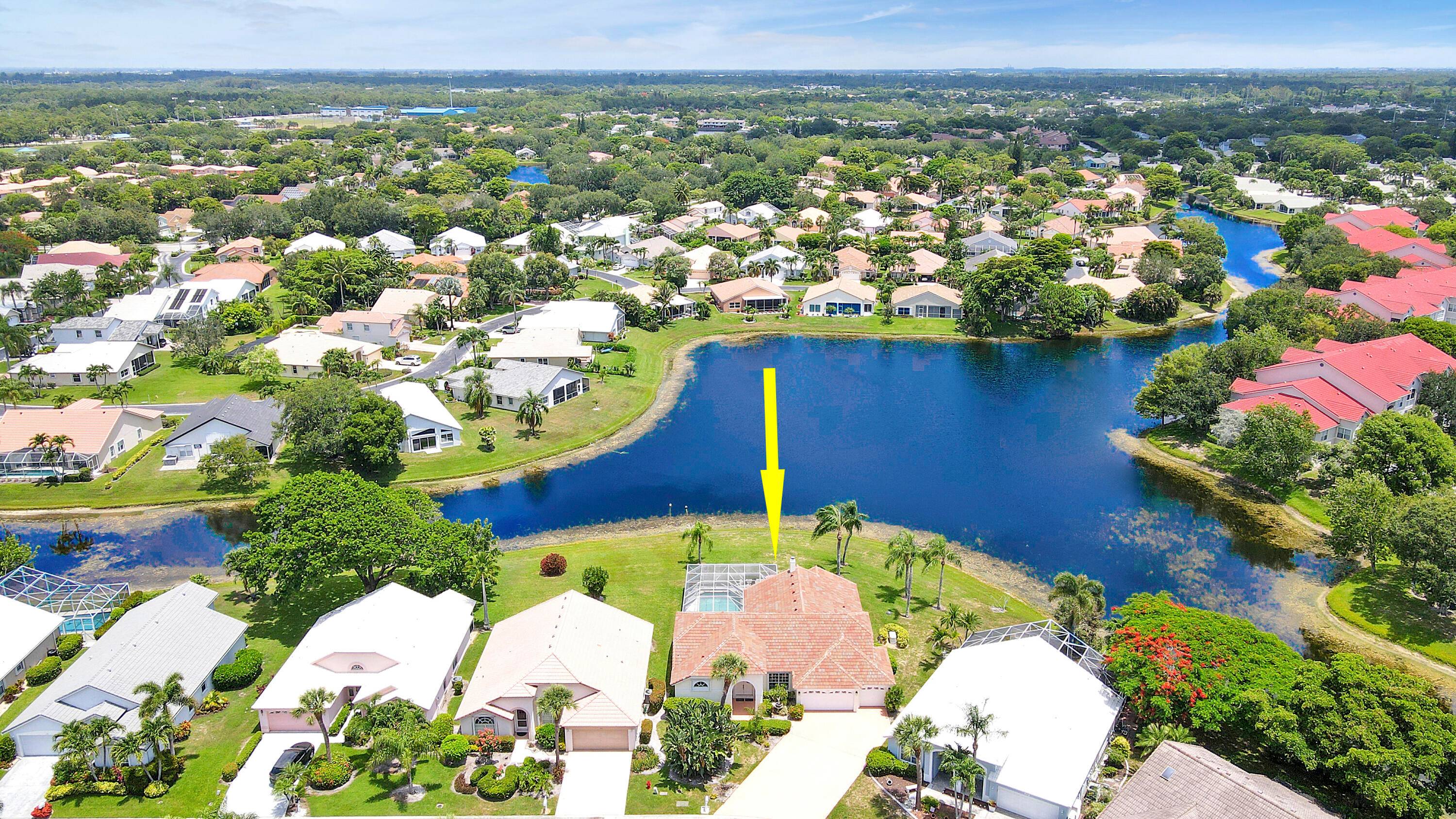 Light and bright 4 Bdrm. 3 Full baths, 3 car garage pool home with expansive lake view.