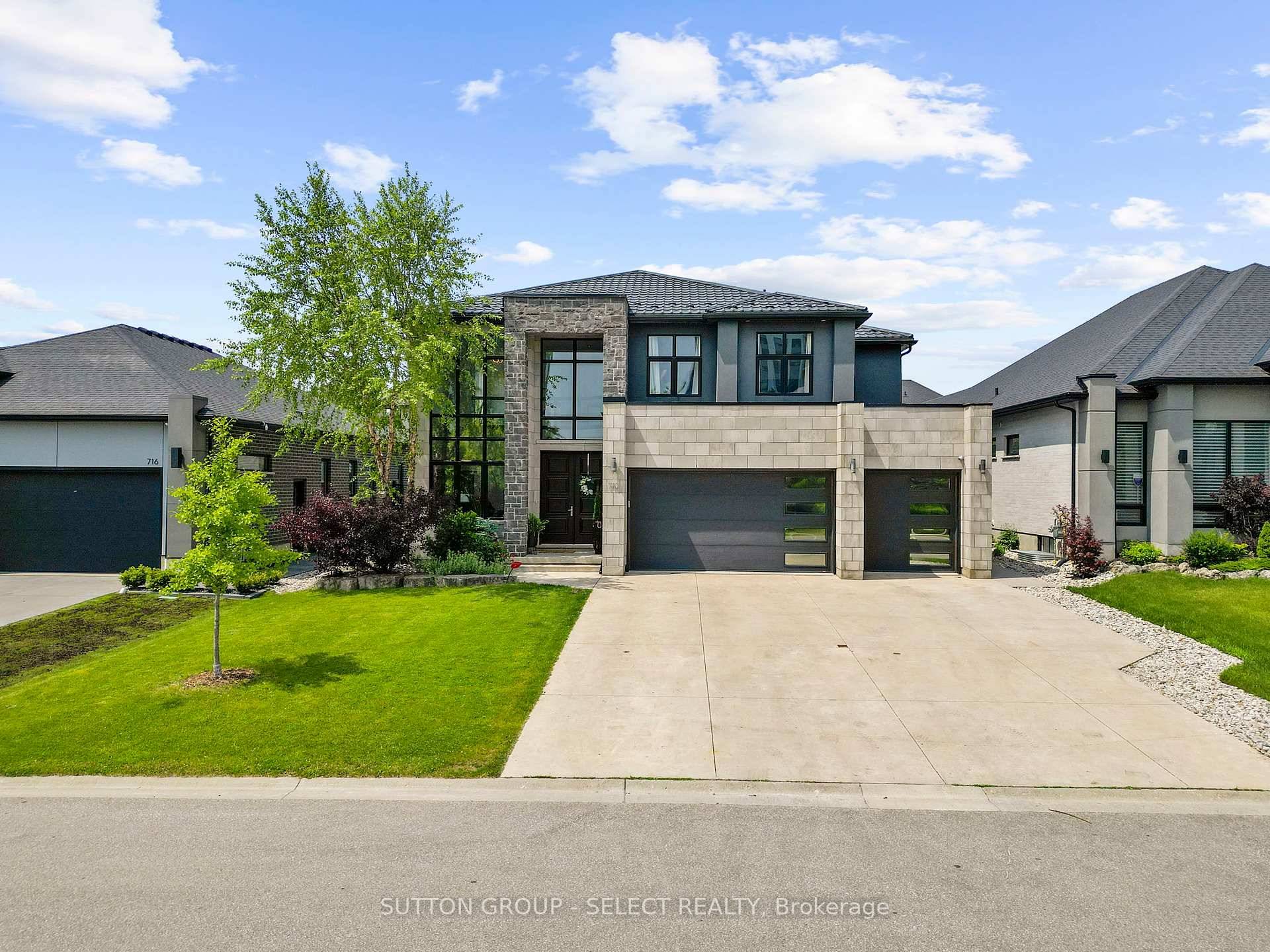 Spectacular custom built former model home in North London, featuring beautiful pond views.