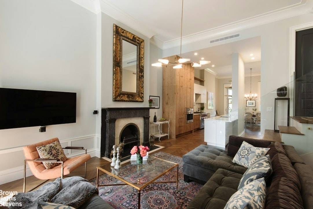 This beautiful garden apartment located in an elegant townhouse has been fully renovated and converted to a 4 bedroom, 3.