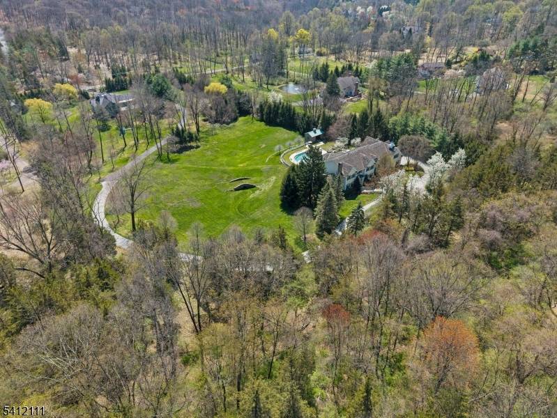 Set behind a gated entrance on 10 private acres, 89 91 Mosle Road is a rare two residence estate compound totaling approximately 15, 000 sqft offering luxury, privacy, and resort ...