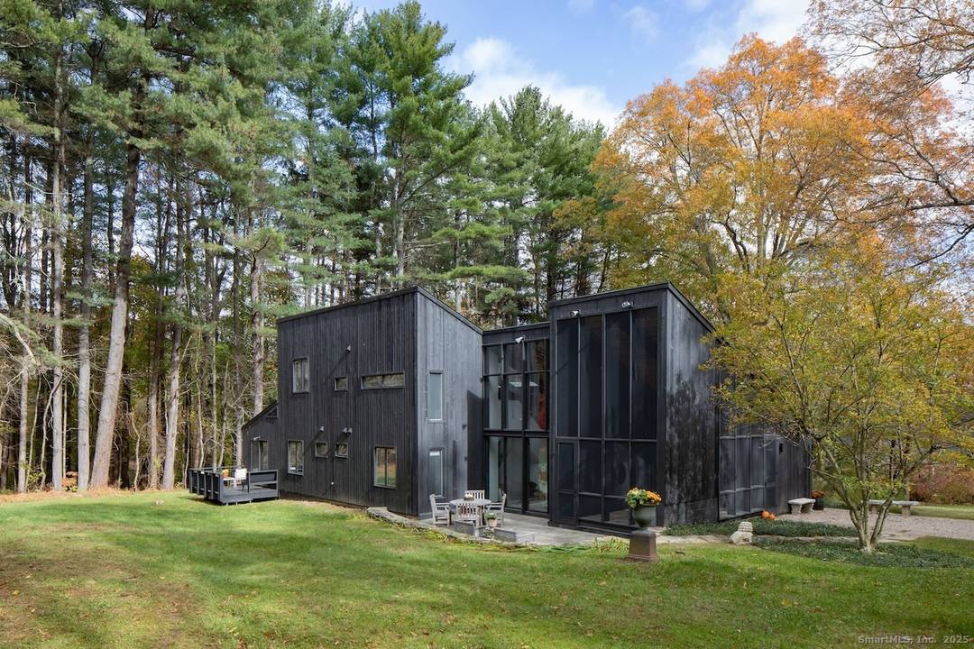 Mid Century Modern Home with Lake Views Lakeville, CT Designed by architect Claude Samton and newly renovated, this true 1960s Mid Century home pairs original character with modern comfort on ...