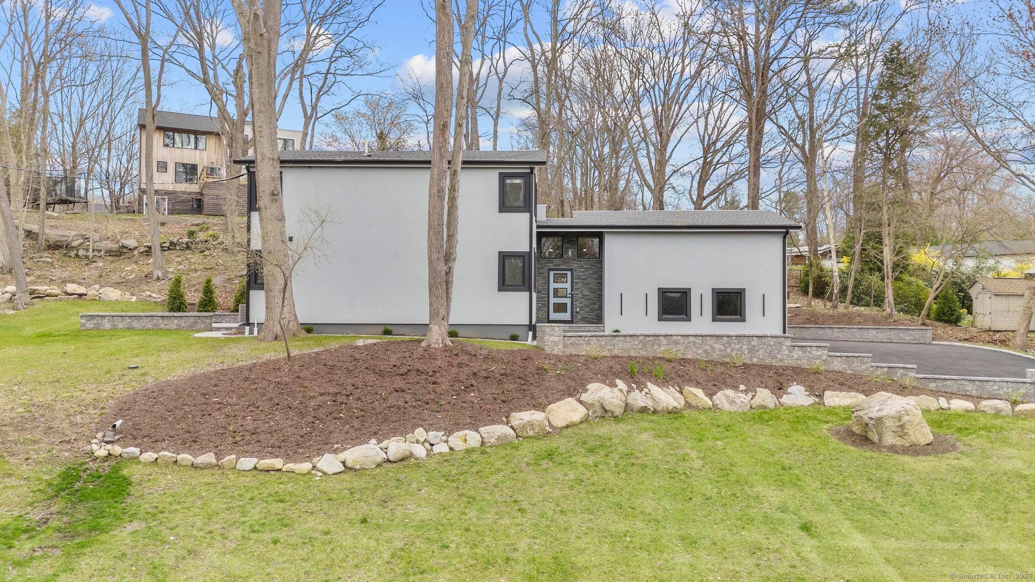 35 Bayberry Lane a stunning, newly rebuilt coastal retreat nestled in the highly sought after Old Sachem Beach neighborhood.