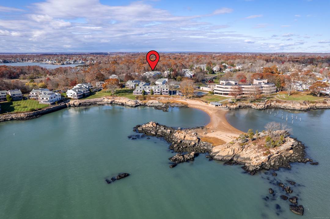 Live the waterfront lifestyle you've been dreaming of in this rarely available 2 bedroom, 2 bath end unit townhouse in coveted Turtle Bay !