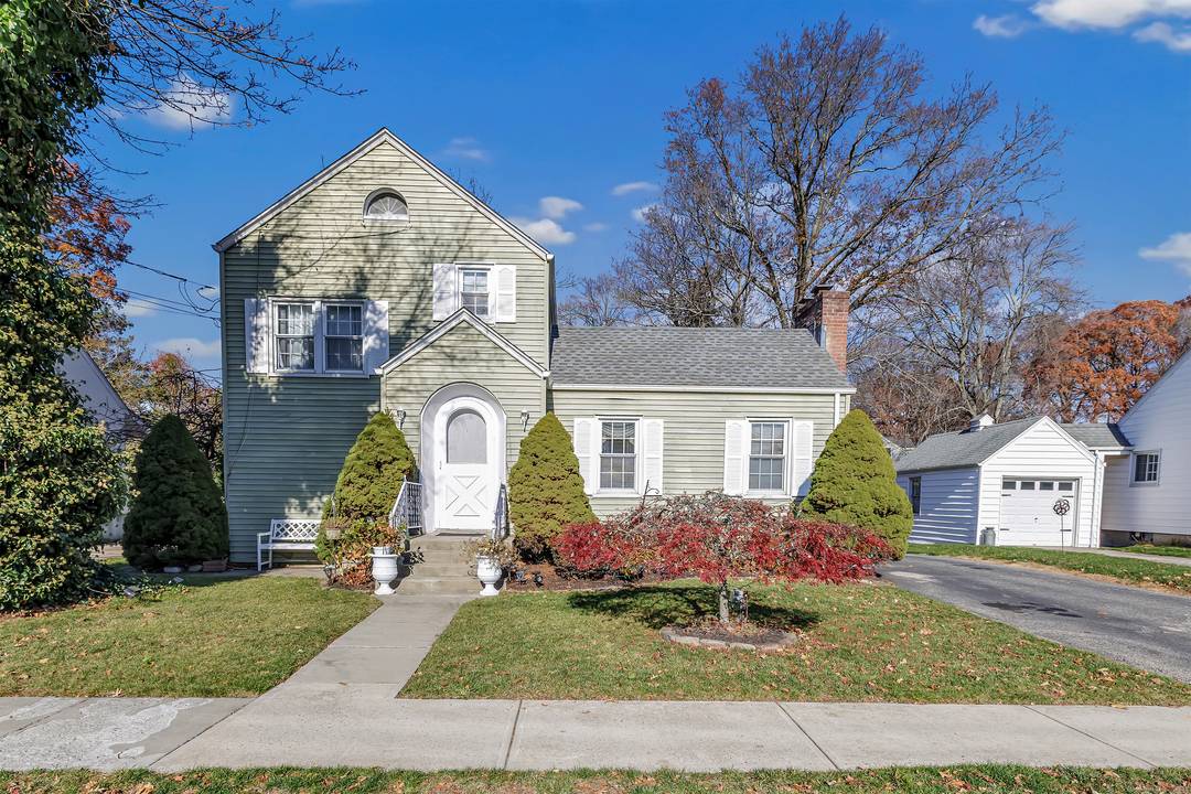 This beautifully appointed Colonial home blends timeless architecture with modern comfort.