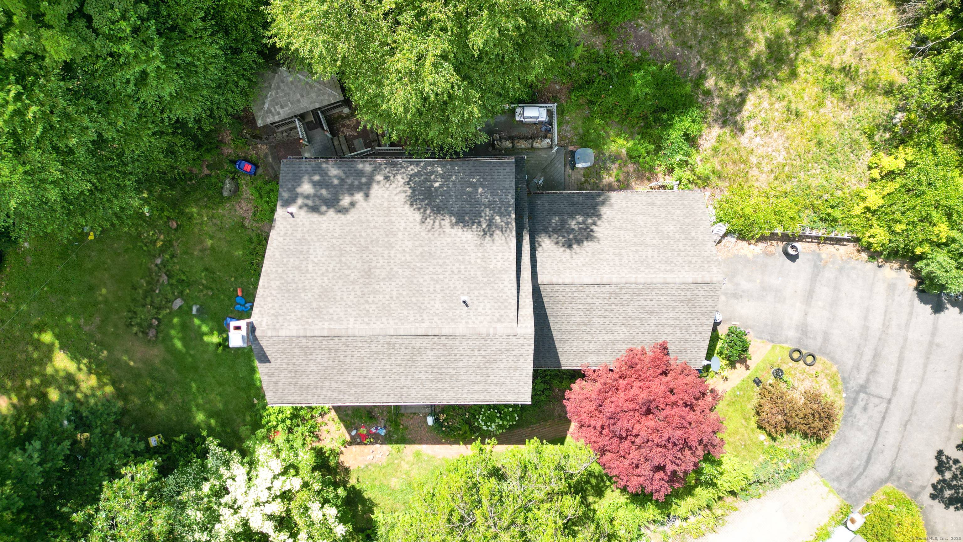 Tucked away on nearly 2 private acres, this beautifully maintained 3 bedroom, 2.
