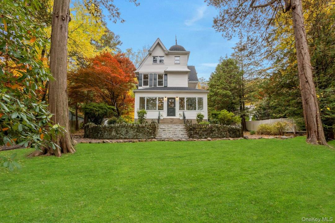 Step into this charming, updated Victorian style residence in Upper Grandview !