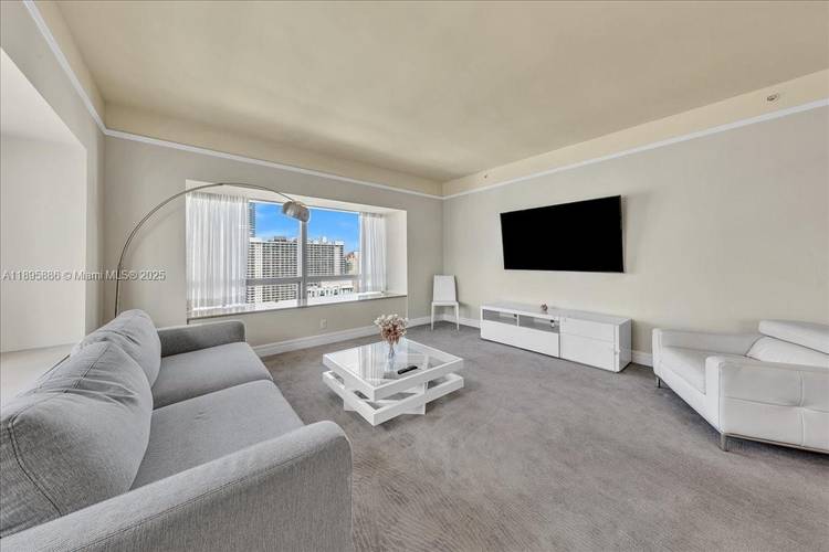 Experience luxury living in this elegant, fully furnished with stunning bay and city viewsat Four Seasons Brickell.