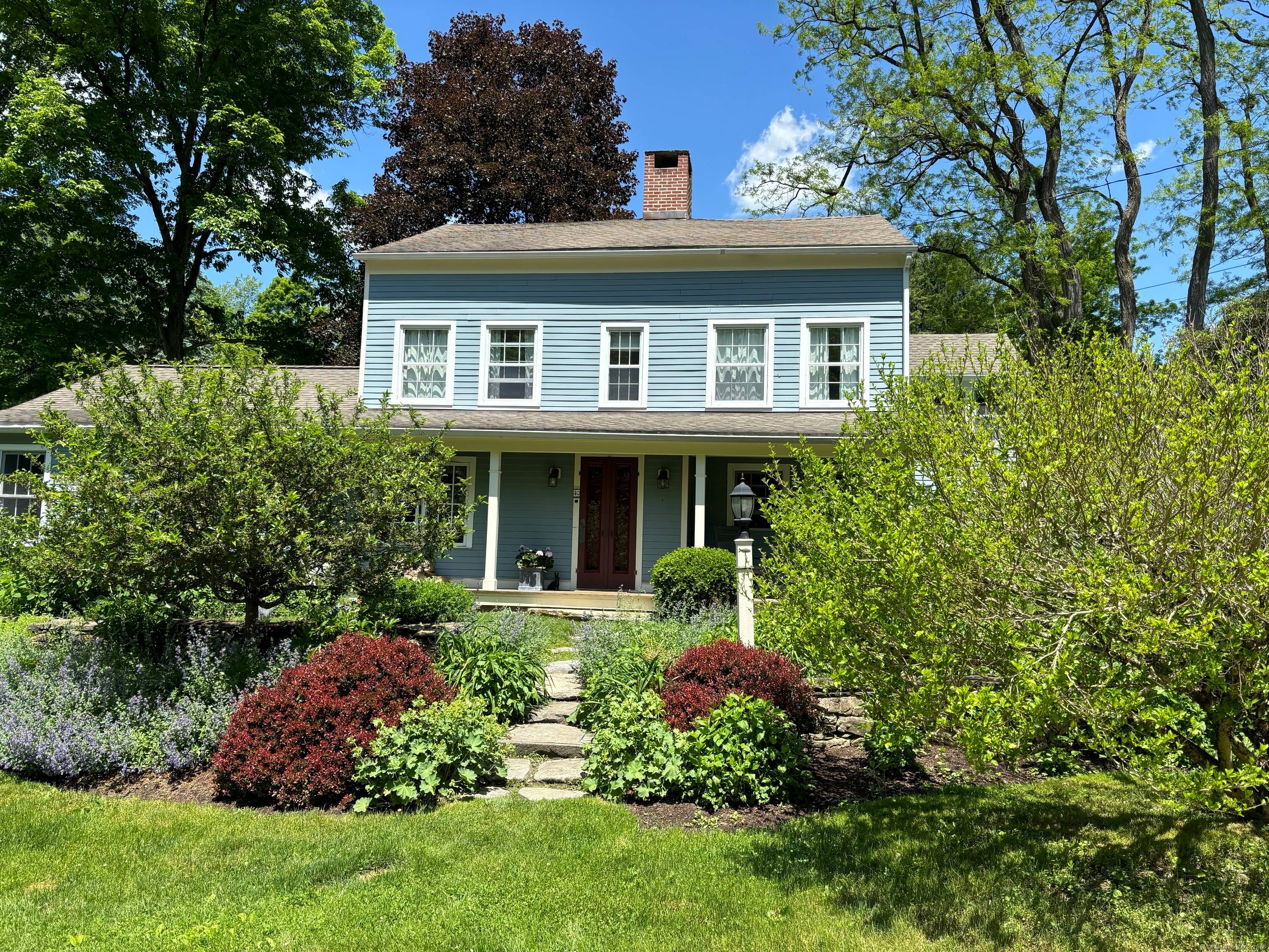 Step into nearly three centuries of New England history with this enchanting 1745 Antique Colonial gracefully positioned on 1 acres straddling the towns of Lakeville and Sharon.