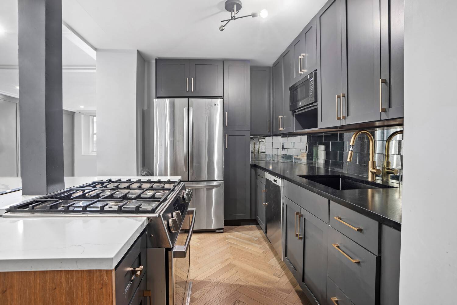 Renovated 3BR 2BA 1, 328 SF South Facing with Herringbone Floors Beautifully renovated and thoughtfully designed, this converted 3 bedroom 2 Bed Home Office, 2 bath home spans 1, 328 ...