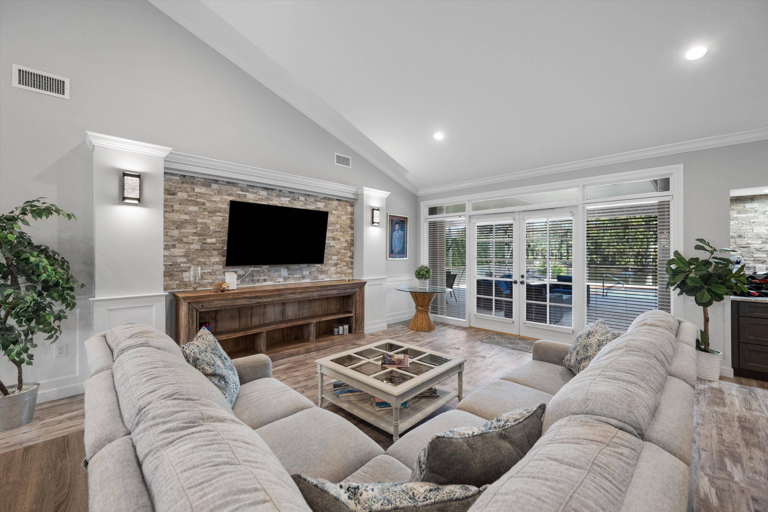 NEWLY PRICED ! Prime water and golf view location in desirable Breakers West in West Palm Beach !