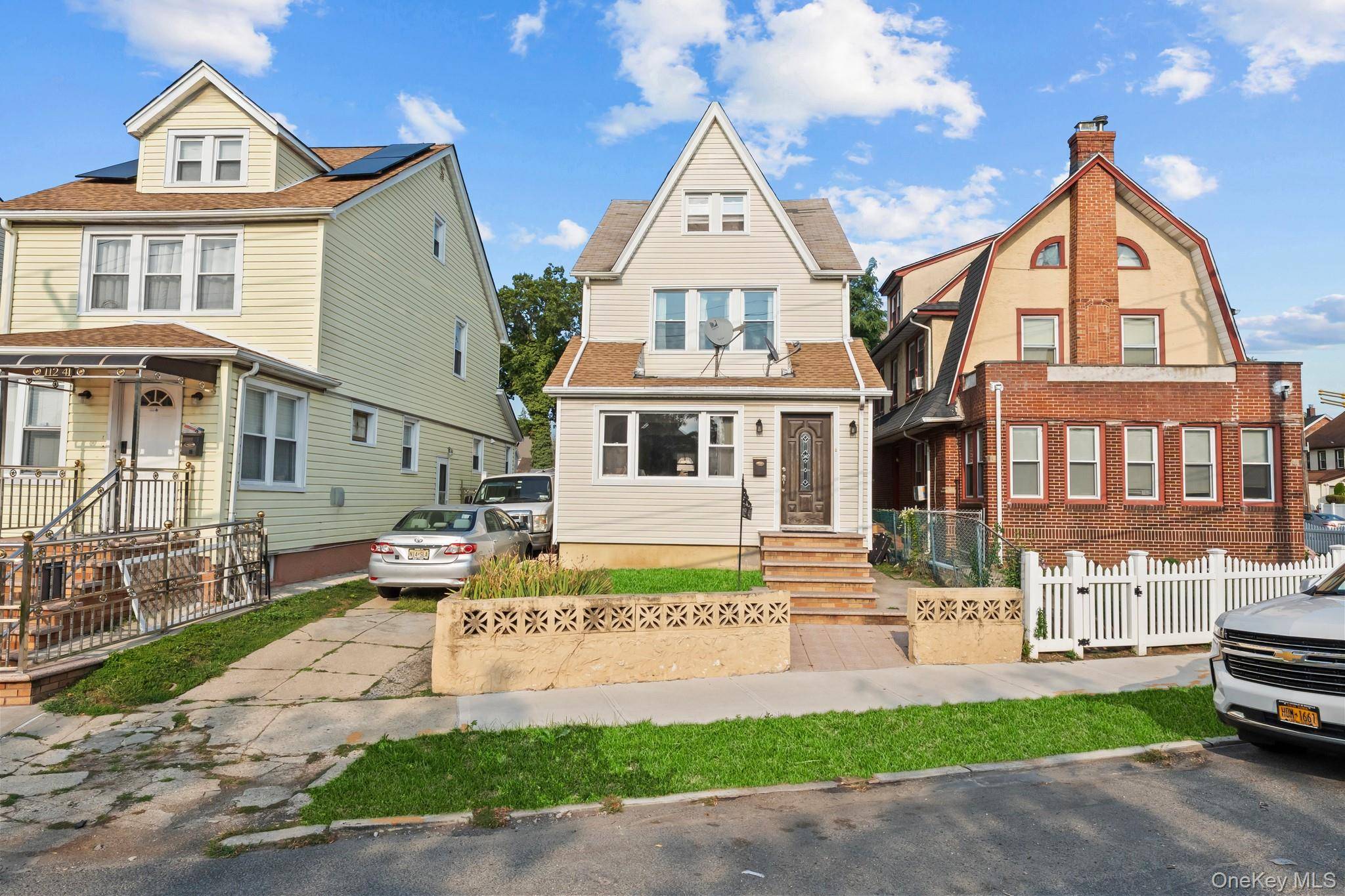 Welcome to this spacious Colonial in the heart of Queens Village !