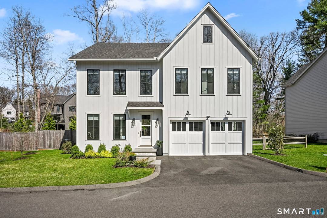 Discover refined, better than new construction at 9 White Barns Lane, ideally located in the desirable White Barns community within Norwalk's sought after Cranbury neighborhood.
