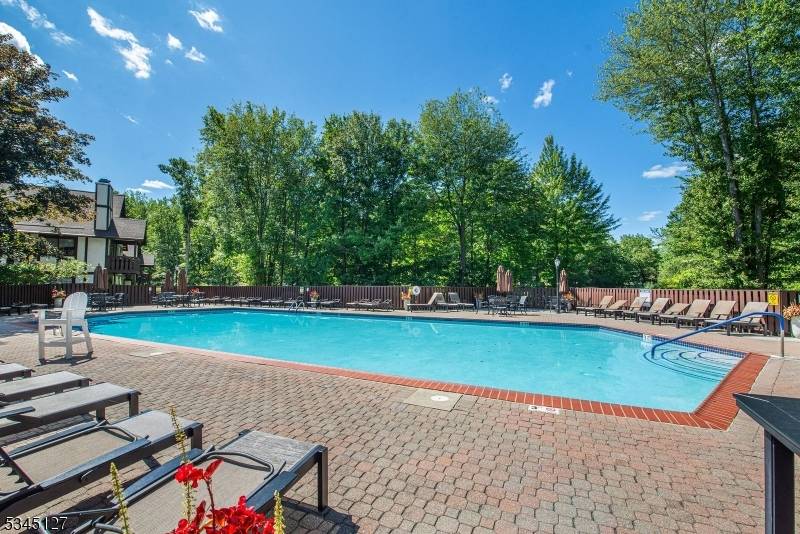 Perfect price and great location for this sunny, well maintained Top floor condo located in desirable Ridge Gardens in Mahwah Nothing to do it's Move in ready.