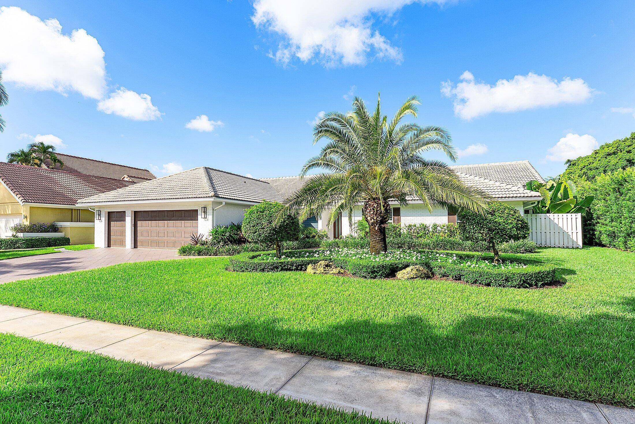Welcome to this stunning, fully renovated contemporary residence in the exclusive Bocaire Country Club.