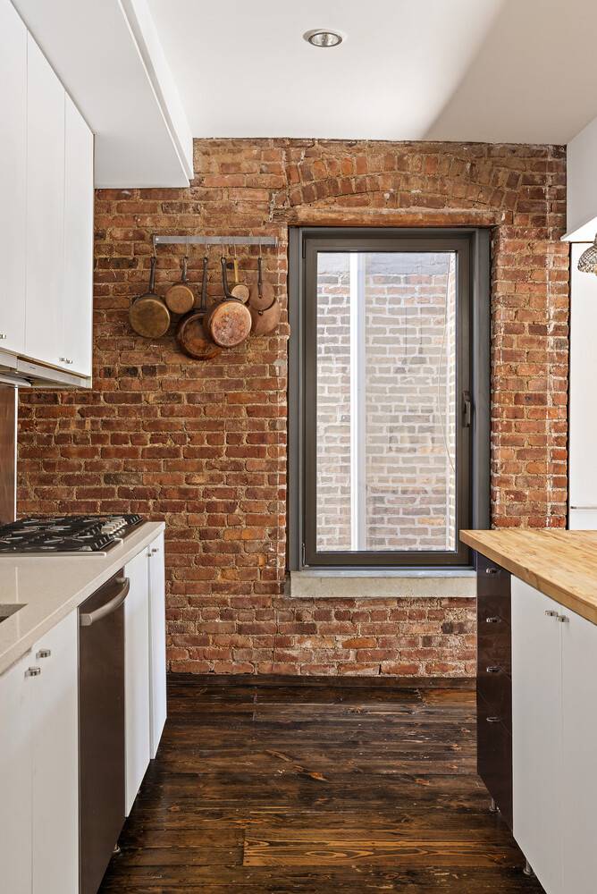 A rare find in a Boerum Hill townhouse, this expansive 2 bedroom possible 3 bedroom co op is full of character, light, and possibilities.