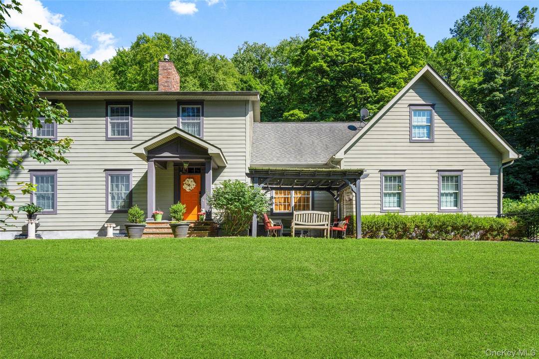 Tucked into a peaceful enclave, this stunning 4 bedroom, 2.