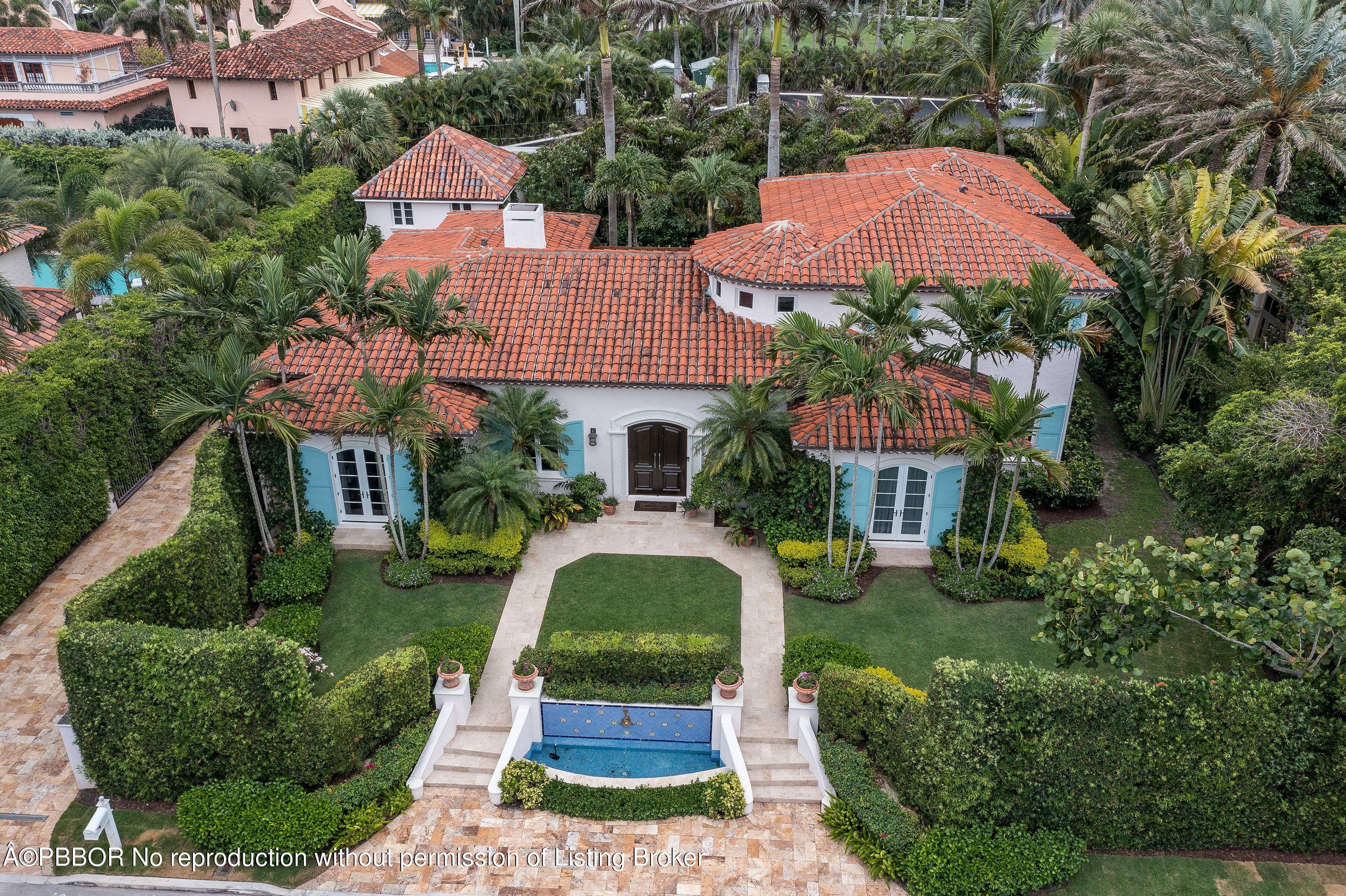 Enjoy this beautiful mediterranean 4BR 5BA home with 1BR 1BA carriage house in the Estate Section with waived Mar a Lago initiation fees.