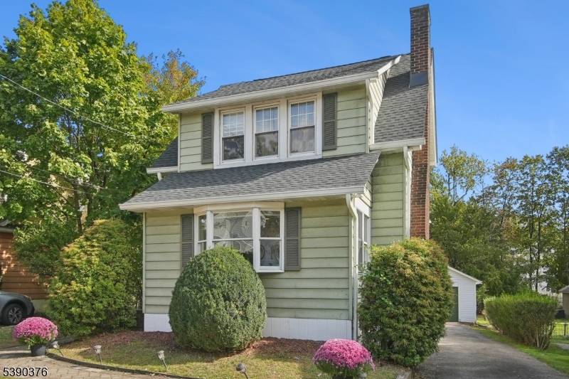 Welcome to 31 Martin Rd, a charming colonial located on a quiet street with a great backyard.