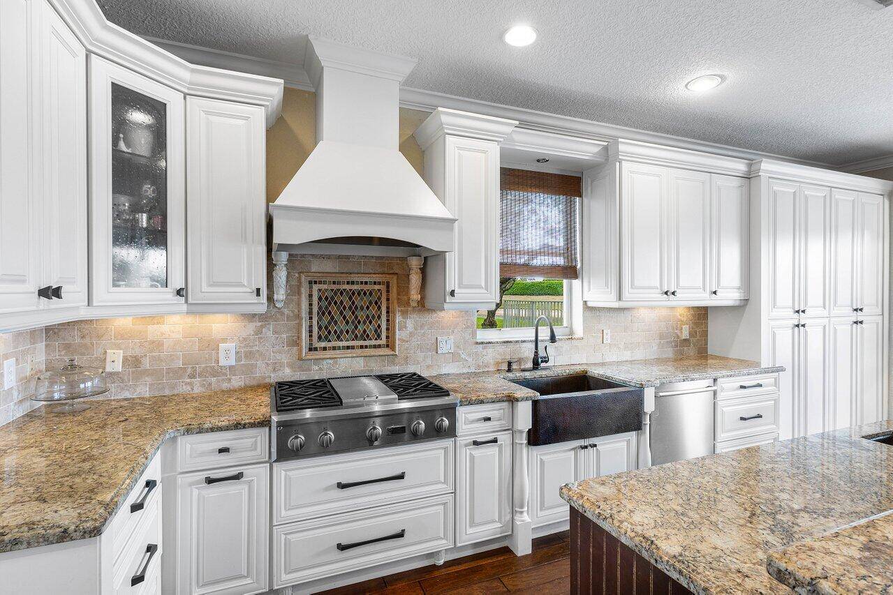 Check out the video ! Privacy abounds at your new dream home in the prestigious gated community of Boca Falls, where luxury meets functionality in this beautifully appointed 4 bedroom, ...