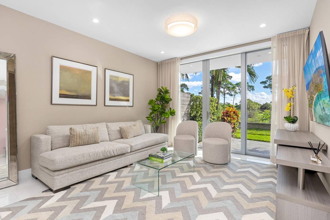 Welcome to 4080 at Moderne Boca Raton, where modern architecture and refined luxury living converge in a premier gated community overlooking a tranquil nature preserve.