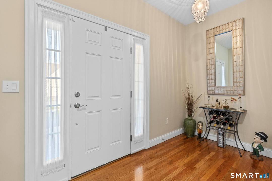 Upon entering this sun filled Cape, you are immediately welcomed by gleaming hardwood floors and a bright, open floor plan designed for both comfort and flow.