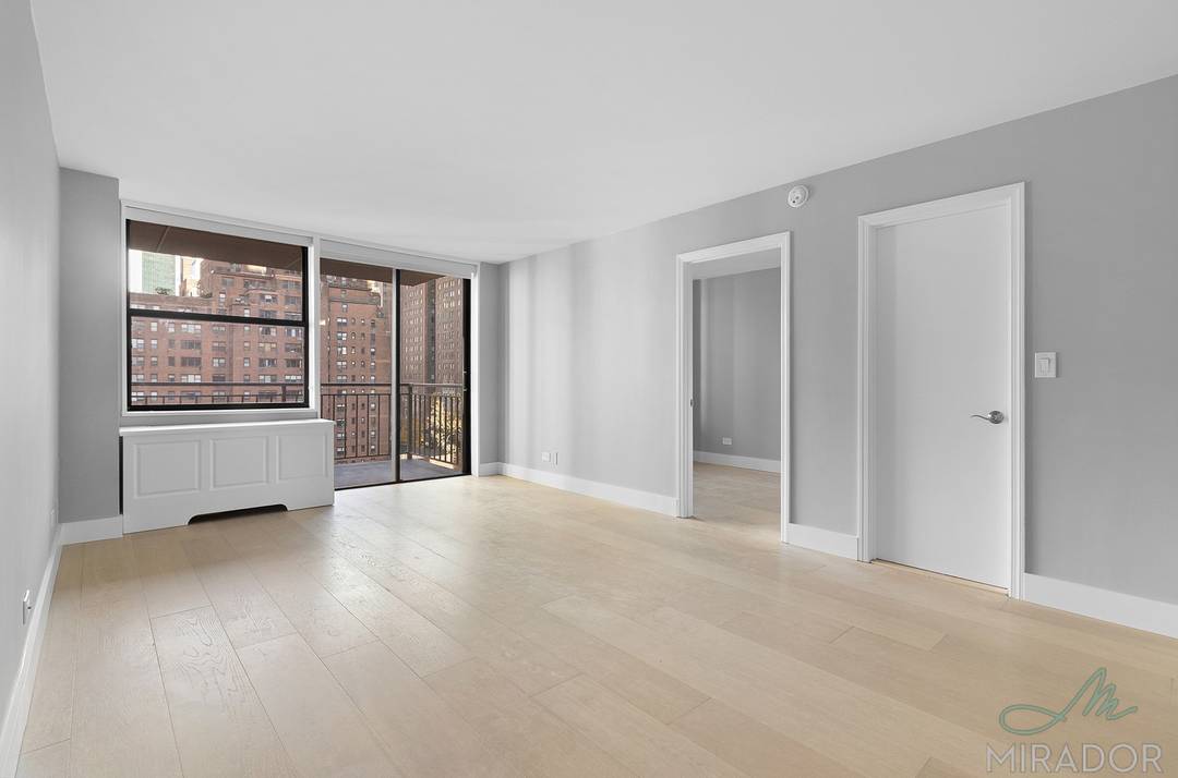 Beautifully renovated north facing 2 bedroom with 2 bathrooms and a private balcony at New York Tower.