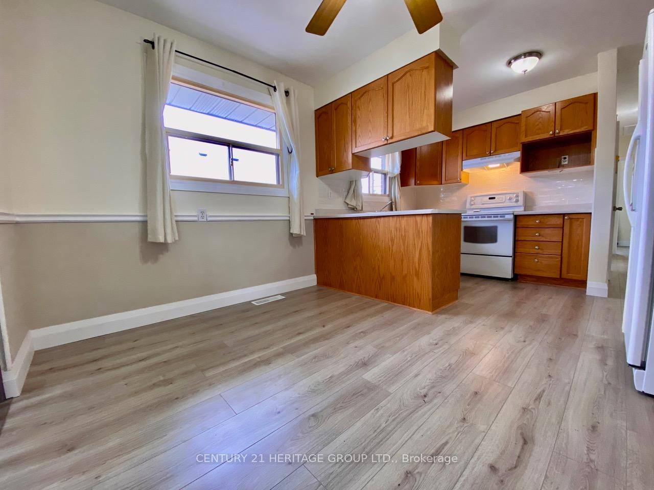Prime Location ! Charming 2 bedroom, 1 bathroom brick bungalow main floor unit, offering bright living space in a quiet neighborhood.