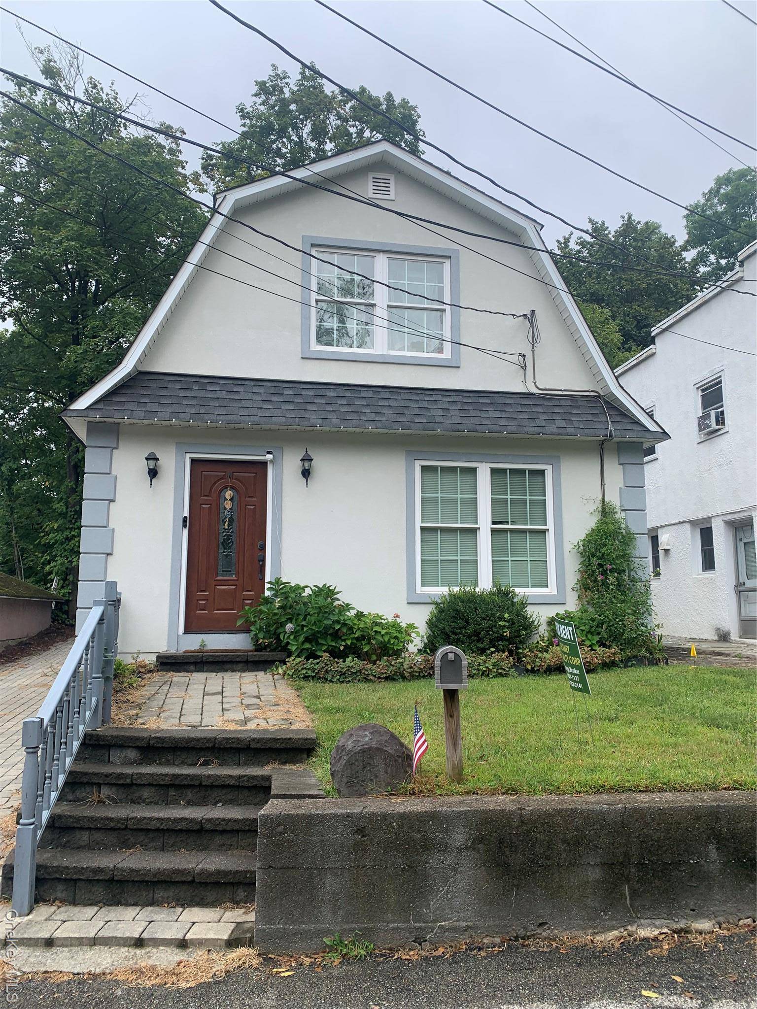 Village Colonial completely updated including open gourmet kitchen with island open to Living Room.