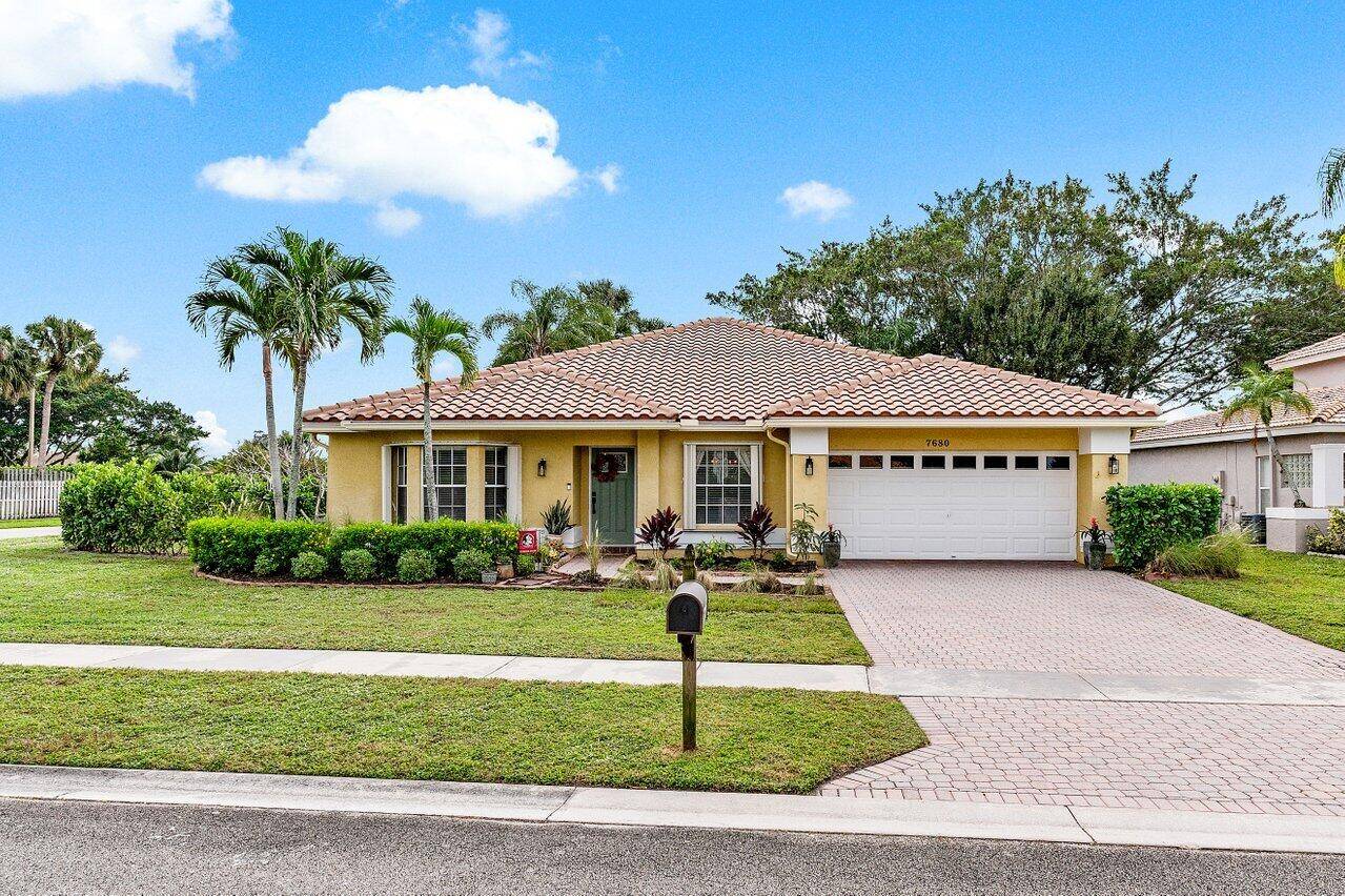 Get ready to fall in love with this stunning three bedroom, two bathroom gem, nestled in the tranquil Lake Charleston community of West Lake Worth.