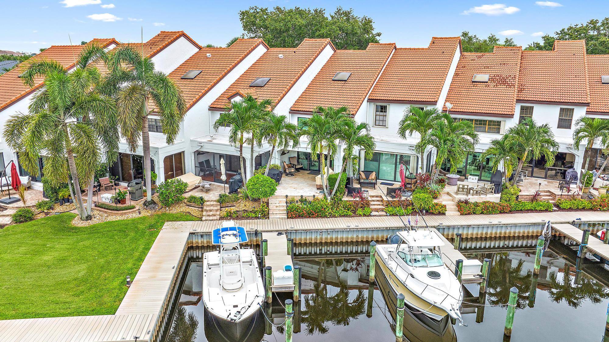 Enjoy premier waterfront living in this exceptional townhome located in the highly sought after Mariner's Cove.