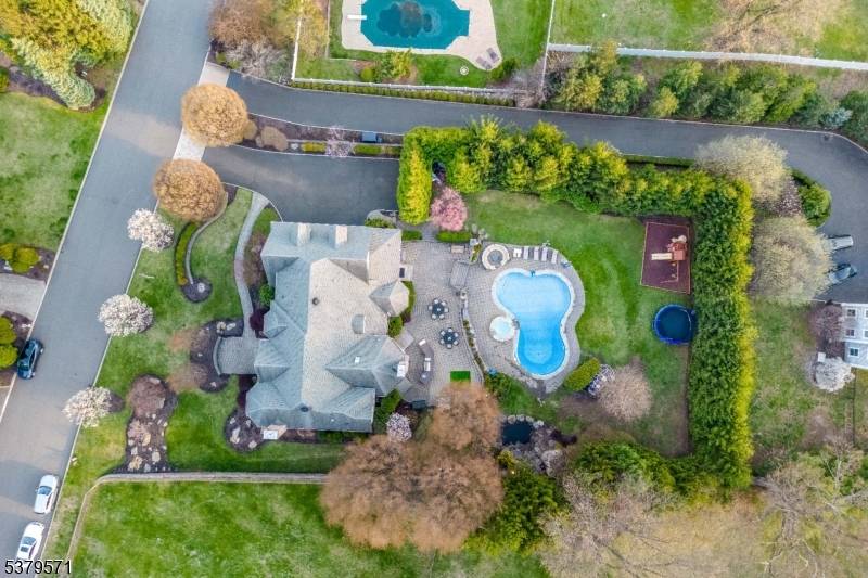 BACK ON MARKET Situated on one of North Haledon's most desired cul de sacs is this incredible brick estate, featuring 7, 500 feet of beautifully finished living space on a ...