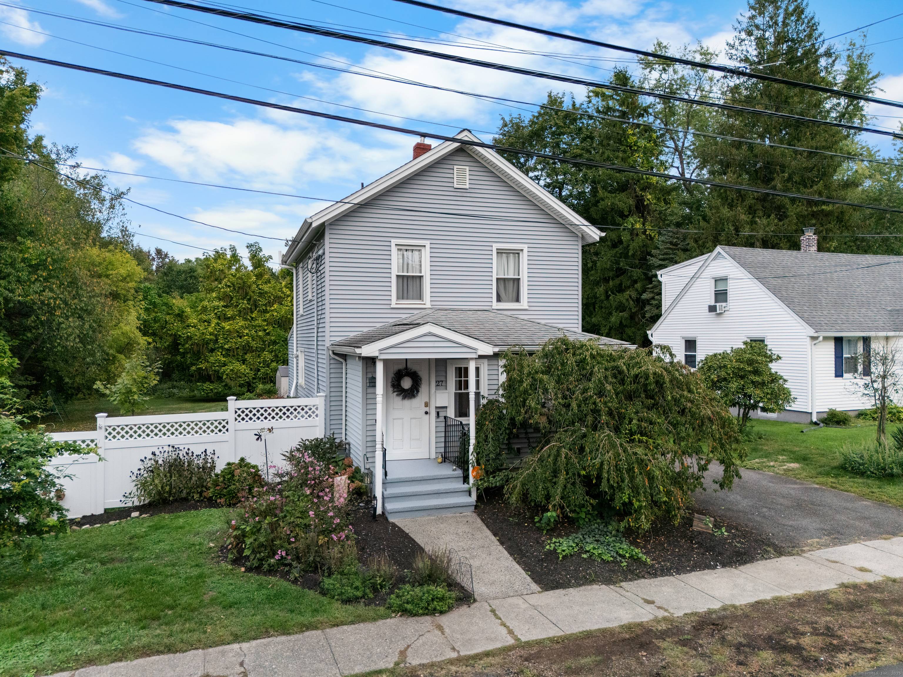 Discover this beautifully maintained three bedroom, two bath colonial set on a generous 0.